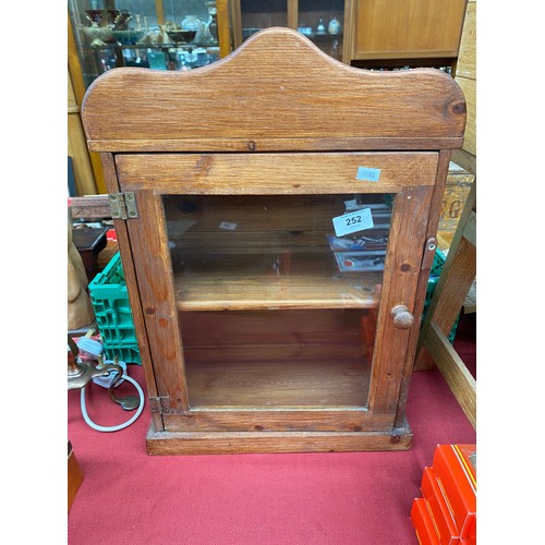 252 - A Vintage Pine small display cabinet