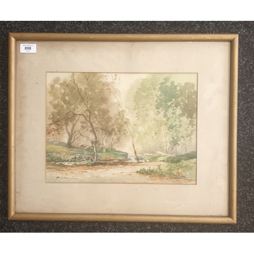 898 - John Cochran
Framed watercolour depicting woodland river sence.
[45x55cm]