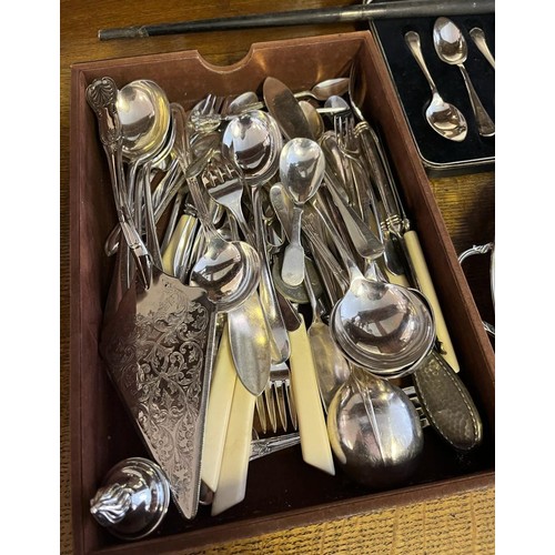 826 - A Selection of silver plated ware to include ornate candle sticks, serving tray, canteen of tea spoo... 