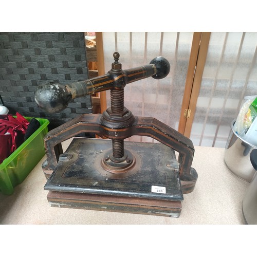 676 - Antique book press