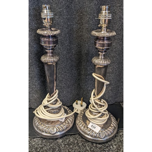 835 - A Pair of antique silver plated table lamps.