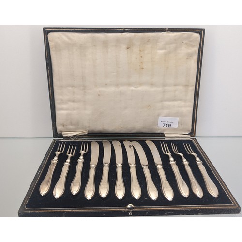 719 - Boxed set of Twelve Birmingham silver handle forks and butter knives.