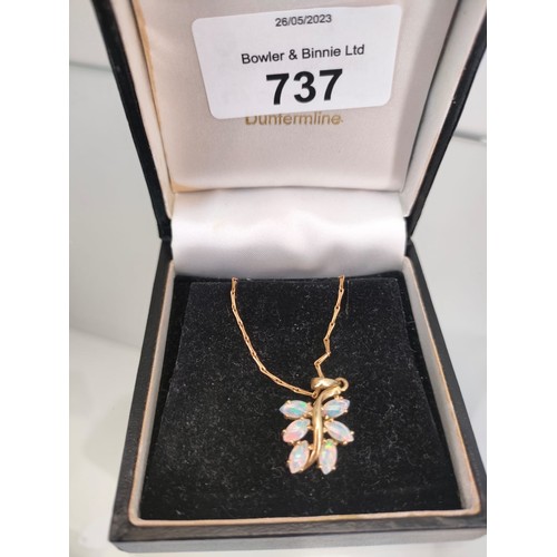 737 - A 9ct yellow gold necklace with a 9ct yellow gold and opal stone pendant. [3.86grams]