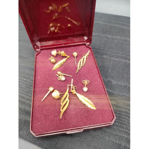 16 - A collection of various 9ct yellow gold earrings. [2.44grams]