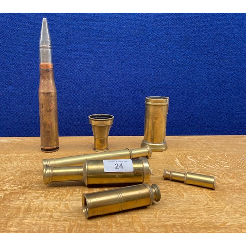 24 - A Selection of World war trench art items along with small brass telescopes