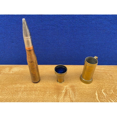 24 - A Selection of World war trench art items along with small brass telescopes