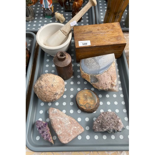 340 - A Tray of collectable crystals stones , pestle and mortar and a wooden box