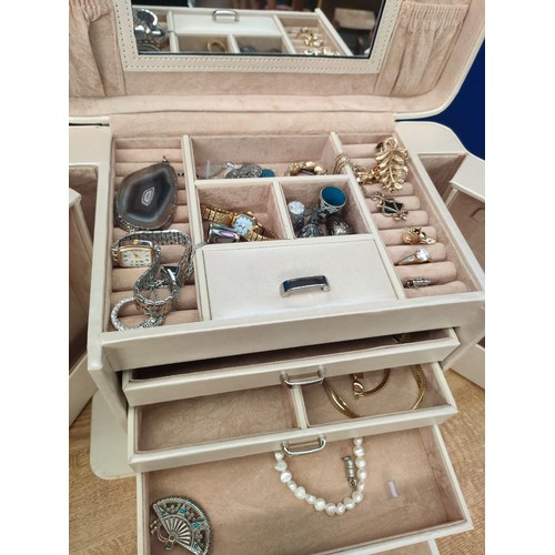 56A - Two jewellery boxes containing mixed costume jewellery, includes watches, earrings, necklaces and pe... 