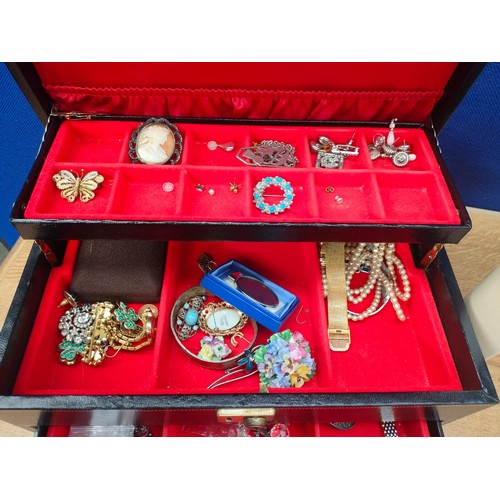 56A - Two jewellery boxes containing mixed costume jewellery, includes watches, earrings, necklaces and pe... 