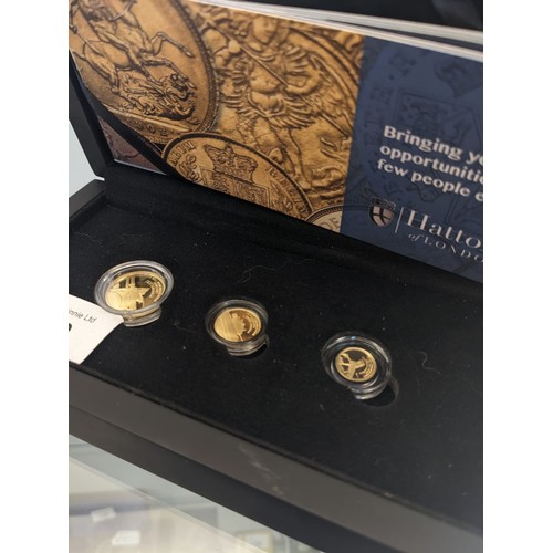 700A - Hattons of London boxed set of three 22ct gold coins. '2021 We Will Remember Them Sovereign Fraction... 