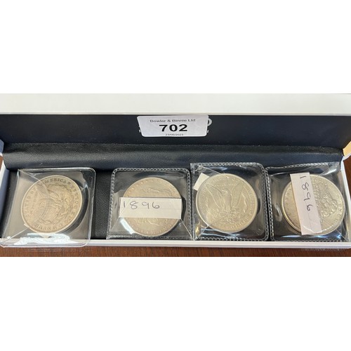 702 - A lot of two 1896 and one 1879 Silver Liberty one dollar coins, together with one reproduction 1896 ... 