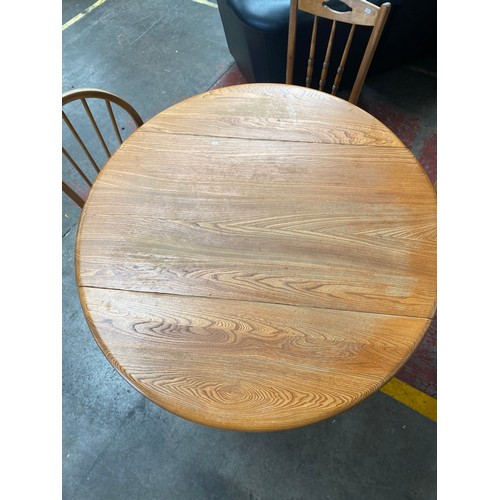 80 - Vintage Ercol light elm drop leaf table, Two lightwood elm wood ercol chairs and one single chair.