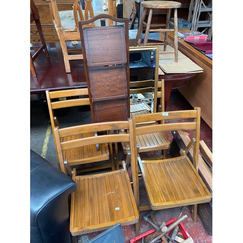 112 - Four folding kitchen chairs, gilt framed mirror and folding cake stand.