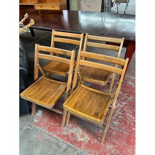 112 - Four folding kitchen chairs, gilt framed mirror and folding cake stand.