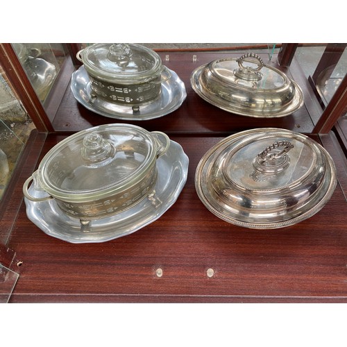 215 - Large collection of silver plated and E.P Wares; Apple menu holders, Lidded serving tureens, Serving... 