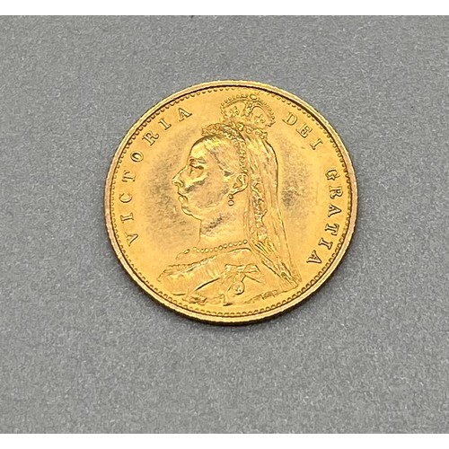 701B - 1887 Queen Victoria gold half sovereign coin.