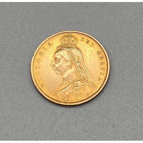 702 - 1887 Queen Victoria gold half sovereign coin.