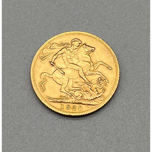 703 - 1928 George V Full Gold Sovereign Coin.