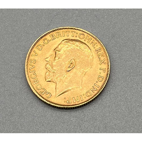 703 - 1928 George V Full Gold Sovereign Coin.