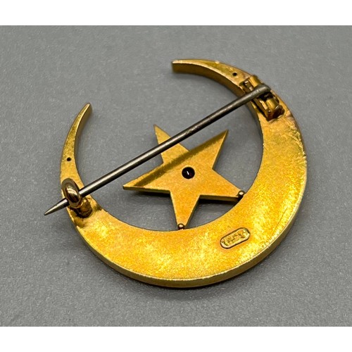 706 - Antique 15ct yellow gold brooch; half crest moon and star, fitted with seed pearls and Ruby stones. ... 