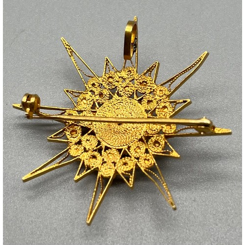 709 - High grade foreign gold star style pendant/ brooch. [Tested positive for 18ct-24ct gold] [7.95grams]