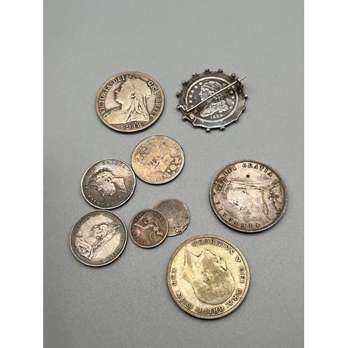 5 - A Selection of silver antique coins; 1834 silver Liberty 25cent coin made into a brooch, 1887 & 1894... 