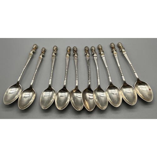 712 - A Set of 10 Victorian Sheffield silver tea spoons fitted with lady bust finials. Produced by James D... 