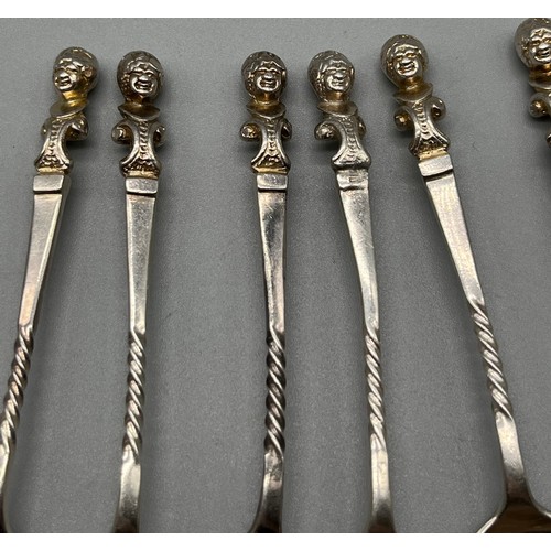 712 - A Set of 10 Victorian Sheffield silver tea spoons fitted with lady bust finials. Produced by James D... 