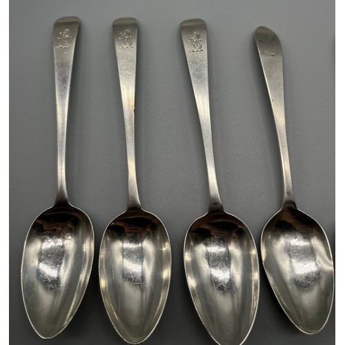 714 - A Collection of Dublin silver table spoons. [199.72grams]