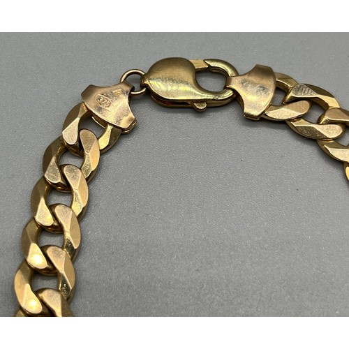 717 - Heavy 9ct yellow gold curb bracelet. [32grams] [21cm in length]