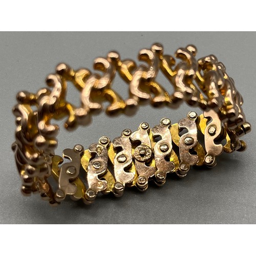 723 - Unusual Antique 9ct yellow gold expanding bracelet. [13.47grams]