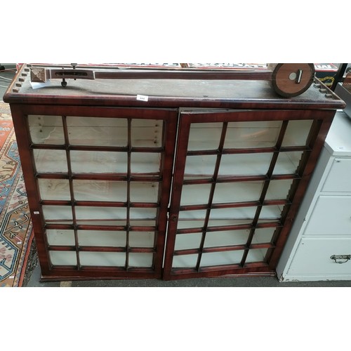 444 - 19th century wood and glass section door bookcase. Has original key.