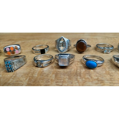 52 - A Collection of 18 various silver rings with some gem stones fitted.