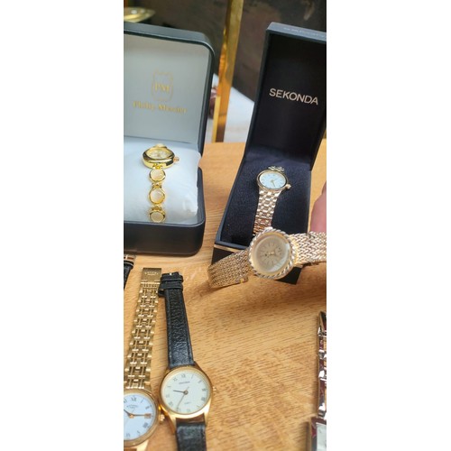 33 - A Collection of boxed and loose ladies watches; Sekonda, Ascot, Accurist, Rone, Rotary and Philip Me... 