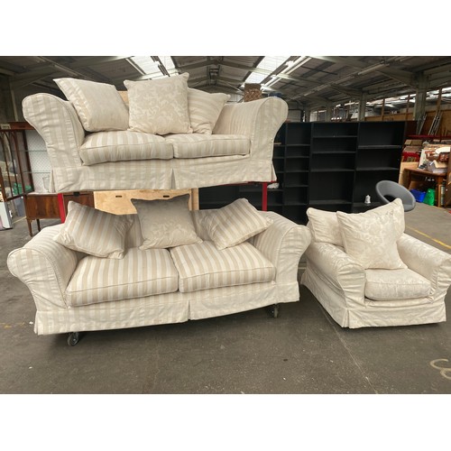 699P - Three piece sofa set. Three seater, two seater and single chair