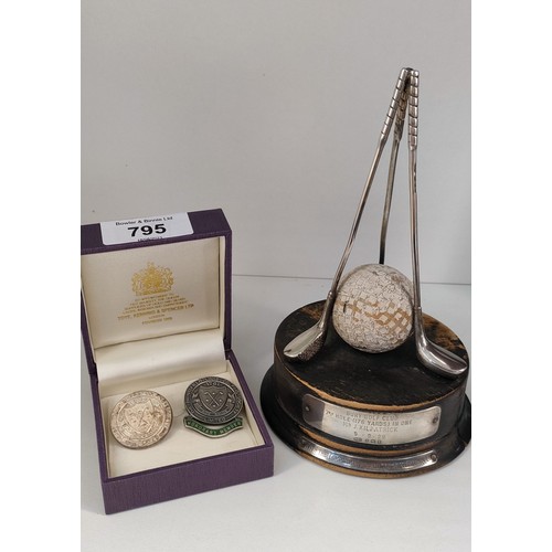 795 - London silver Golf club trophy; Three silver golf clubs with a fitted silver king golf ball all sat ... 