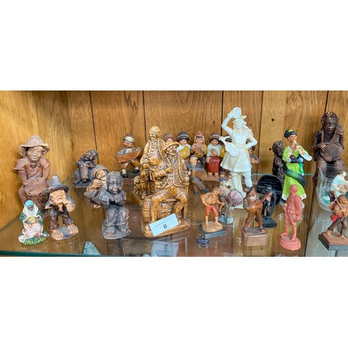 8 - Shelf of various figurines to include figures of a musical theme