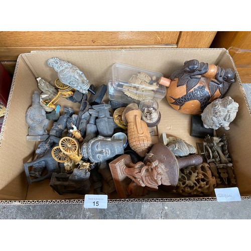 15 - A box of far eastern items to include; stone figurines, busts, and carved display pieces, Buddha Dei... 