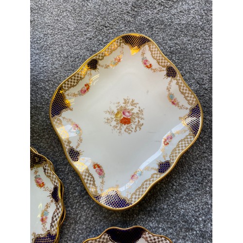 237 - Wedgwood floral design plates and comport dishes; gilt trims and cobalt blue trims