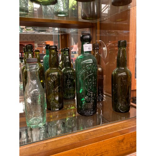 19 - A collection of antique Dunfermline bottles to include names such as; [Robert Douglas] [James Wilson... 