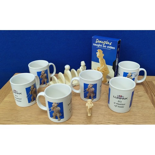 225 - Lurpak Douglas collectors mugs, toast rack and video