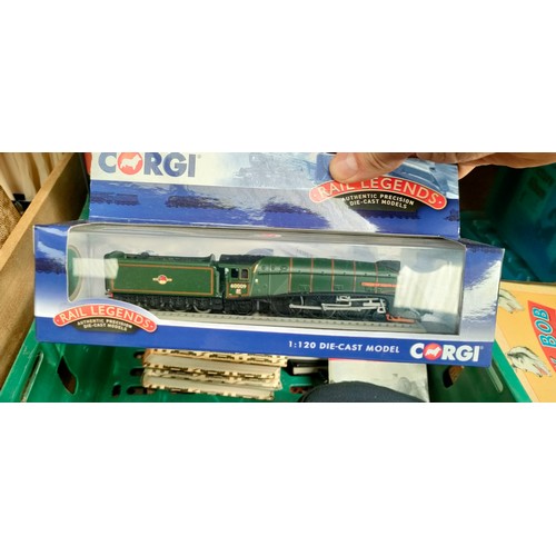 230 - Box of train collectables to include books, hat, train models and leather satchel.