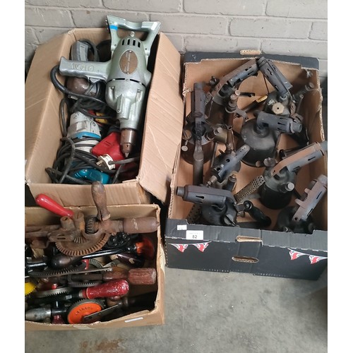 82 - Three boxes of mixed tools; Burners, Hand crank brace drills and Wolf electrical tools.