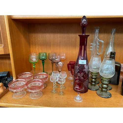 52 - Shelf of antique and vintage art glass; Facet cut ruby glass decanter with stopper, Four green ribbe... 