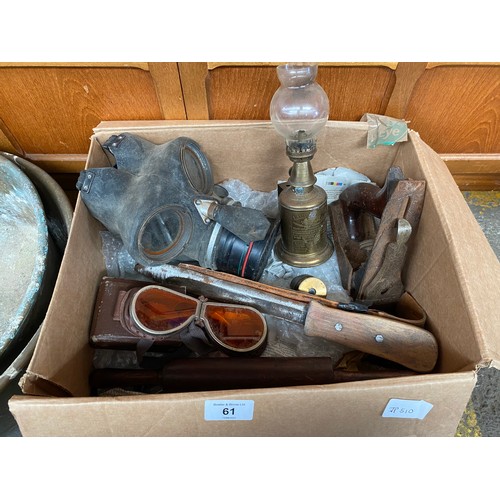 61 - Box of collectables; Possible military folding googles, Gas Mask, Stanley wood plane, Wooden rolling... 