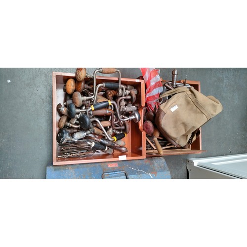 265 - Four boxes of vintage tools to include; hand drills and hammers etc together with a tool box filled ... 