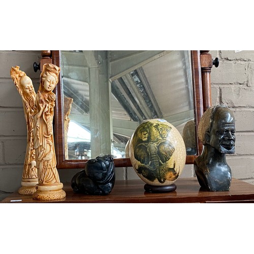 78 - Collectable odds; Ostrich egg, African carved stone bust, carved stone hippo sculpture and two resin... 