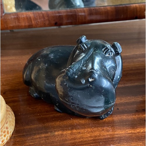 78 - Collectable odds; Ostrich egg, African carved stone bust, carved stone hippo sculpture and two resin... 