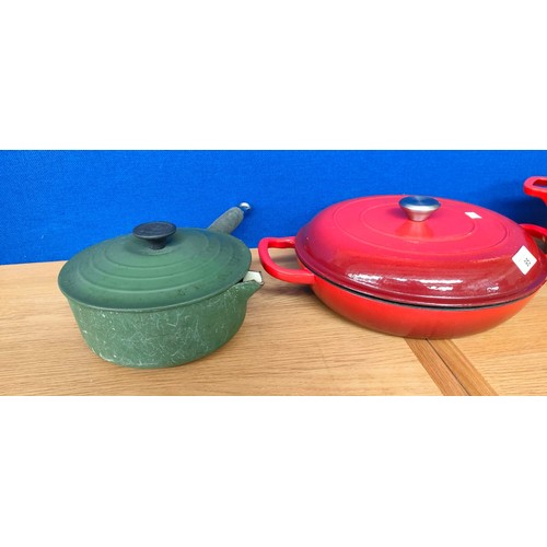 95 - Three enamelled cooking pots/ lidded tureens. Le Creuset Green lidded pot, Ernesto red lidded two ha... 