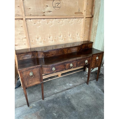 70 - Large Georgian mahogany sideboard; break front and top section, fitted with brass lion head and hoop... 